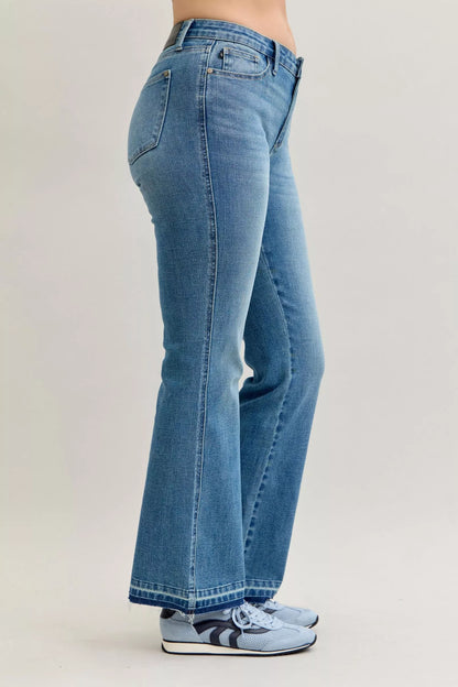 Judy Blue Mid Rise Slim Bootcut Tummy Control Release Hem Jeans 💙 at In Style Chics Boutique 